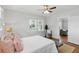 Bright bedroom featuring hardwood floors and views into living room at 210 15Th N Ave, St Petersburg, FL 33704