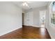Spacious bedroom featuring hardwood floors and multiple closets with access to bathroom at 210 15Th N Ave, St Petersburg, FL 33704