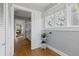 Hallway has hardwood floors and leads into kitchen and living room at 210 15Th N Ave, St Petersburg, FL 33704