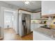 Spacious kitchen with stainless steel refrigerator at 210 15Th N Ave, St Petersburg, FL 33704