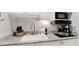 Kitchen area features granite countertops, stainless sink and faucet, plus appliances at 210 15Th N Ave, St Petersburg, FL 33704