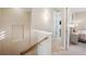 Second floor hallway with stylish lighting leading to a bedroom at 2280 Mackenzie Ct, Clearwater, FL 33765