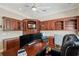 Bright office space with custom built-ins, large desk, and ample storage at 2280 Mackenzie Ct, Clearwater, FL 33765