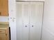 Spacious pantry in the kitchen with louvered doors at 24862 Us Highway 19 N # 2801, Clearwater, FL 33763