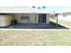 Covered patio with sliding glass doors, connecting indoor/outdoor living space at 24862 Us Highway 19 N # 2801, Clearwater, FL 33763