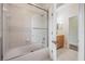 Clean bathroom with glass-enclosed shower, with sink and vanity at 2665 Lakebreeze N Ln, Clearwater, FL 33759