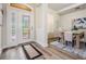 Inviting foyer featuring a decorative glass front door, with dining room views at 2665 Lakebreeze N Ln, Clearwater, FL 33759