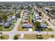 Aerial view of a cozy neighborhood; property marked with red pin at 269 Algiers Dr, Venice, FL 34293