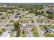 Expansive aerial view highlighting the neighborhood and landscaping at 269 Algiers Dr, Venice, FL 34293