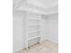 A well-organized closet with built-in shelves and ample hanging space for efficient storage at 269 Algiers Dr, Venice, FL 34293