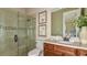 Modern bathroom featuring tiled shower, vanity with marble countertop, and stylish fixtures at 29845 Imperati Blvd, Wesley Chapel, FL 33543