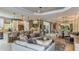 Open-concept living area flows seamlessly into the kitchen and dining space, perfect for entertaining at 29845 Imperati Blvd, Wesley Chapel, FL 33543