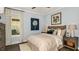 Cozy bedroom with a decorative headboard and side tables for convenient storage at 29863 Imperati Blvd, Wesley Chapel, FL 33543