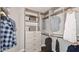 Well-organized walk-in closet with shelves and hanging rods at 29863 Imperati Blvd, Wesley Chapel, FL 33543