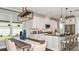 Well-designed kitchen and dining area with stainless steel appliances and room for entertaining at 29863 Imperati Blvd, Wesley Chapel, FL 33543