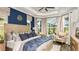 Luxurious main bedroom with bay window and decorative details at 29863 Imperati Blvd, Wesley Chapel, FL 33543