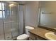 Clean bathroom with a glass-enclosed shower, toilet, and single-sink vanity with countertop at 3112 E 8Th Ave, Tampa, FL 33605