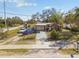 Charming single-story home with a well-maintained front yard and convenient driveway parking at 4002 W Gray St, Tampa, FL 33609