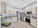 Modern kitchen featuring stainless steel appliances and ample counter space at 4331 Foxboro Dr, New Port Richey, FL 34653