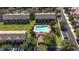 Relaxing community featuring a central pool, well-manicured lawns, and convenient parking for residents and guests at 4535 Kennewick Pl, Riverview, FL 33578