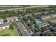 A tranquil community offering lush landscaping, a sparkling pool, and easy access to highways and nearby attractions at 4535 Kennewick Pl, Riverview, FL 33578