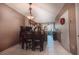 Cozy dining area featuring tile flooring, a stylish light fixture, and easy access to the kitchen at 4535 Kennewick Pl, Riverview, FL 33578