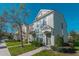 Inviting two-story townhome with a well-maintained lawn, and a cozy, covered front entrance at 4535 Kennewick Pl, Riverview, FL 33578
