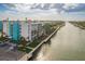 This aerial view highlights the beautiful community's waterfront location and lush landscaping at 4904 38Th S Way # 316, St Petersburg, FL 33711