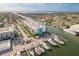 Aerial view showcasing the condo complex with waterfront access and boat docks along the canal at 4904 38Th S Way # 316, St Petersburg, FL 33711