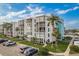 This aerial view showcases the pool, waterfront, marina, and parking at 4904 38Th S Way # 316, St Petersburg, FL 33711