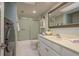 Bathroom featuring a shower, vanity and storage at 4904 38Th S Way # 316, St Petersburg, FL 33711