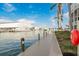 This view showcases the neighborhood's private dock with luxury yachts at 4904 38Th S Way # 316, St Petersburg, FL 33711