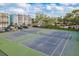 Aerial view of the community tennis courts and some condo buildings in the background at 4904 38Th S Way # 316, St Petersburg, FL 33711