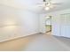 Spacious bedroom with neutral colors and ample closet space at 4955 Grist Mill Cir, New Port Richey, FL 34655