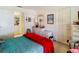 Bright bedroom with closet and door to other room at 4955 Grist Mill Cir, New Port Richey, FL 34655