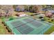 Multiple well-maintained tennis courts offer opportunities for recreational enjoyment at 4955 Grist Mill Cir, New Port Richey, FL 34655