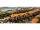 Waterfront condo community with beautiful architecture and landscaping, offering stunning views and serene living at 5000 Culbreath Key Way # 1-310, Tampa, FL 33611