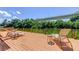 Relaxing waterfront dock featuring lounge chairs and scenic views, perfect for enjoying the Florida lifestyle at 5000 Culbreath Key Way # 1-310, Tampa, FL 33611