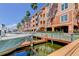 Waterfront condo complex featuring boat docks and private boat slips providing convenient access to the water at 5000 Culbreath Key Way # 1-310, Tampa, FL 33611