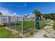 Fenced dog park with green space, providing a safe and enjoyable area for pets at 5000 Culbreath Key Way # 1-310, Tampa, FL 33611