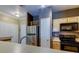 Bright kitchen with updated appliances, wine storage, and ample counter space at 5000 Culbreath Key Way # 1-310, Tampa, FL 33611