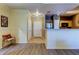 Open-concept living area featuring hardwood floors, stainless steel appliances, and modern finishes at 5000 Culbreath Key Way # 1-310, Tampa, FL 33611