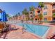 Enjoy the community pool with lounge chairs and tropical landscaping at this waterfront condo complex at 5000 Culbreath Key Way # 1-310, Tampa, FL 33611