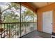 Enclosed porch with views of trees and nature at 5000 Culbreath Key Way # 1-310, Tampa, FL 33611