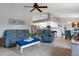 Open floor plan with living room flowing into kitchen, and casual dining area at 5140 Eclipse Ct, Spring Hill, FL 34607
