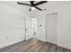 Light and airy bedroom featuring a ceiling fan, closet, and bathroom access at 708 15Th W Ave, Palmetto, FL 34221