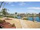 Beautiful backyard waterway views with lush greenery and a private dock at 709 Flamingo Dr, Apollo Beach, FL 33572