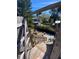 View of backyard from an elevated wooden staircase at 7828 Davis St, Port Richey, FL 34668