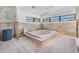 Bright bathroom with large tub and ample space, perfect for remodeling at 120 Carlyle Cir, Palm Harbor, FL 34683