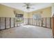 Bedroom featuring two windows and natural light, awaiting renovation at 120 Carlyle Cir, Palm Harbor, FL 34683
